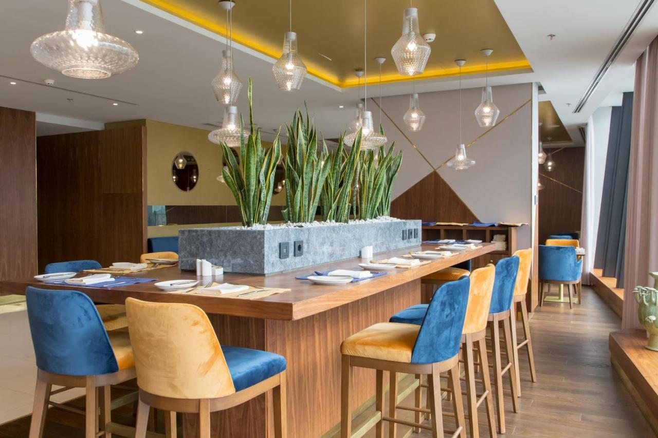스위소텔 사라예보 호텔 외부 사진 The interior of the restaurant