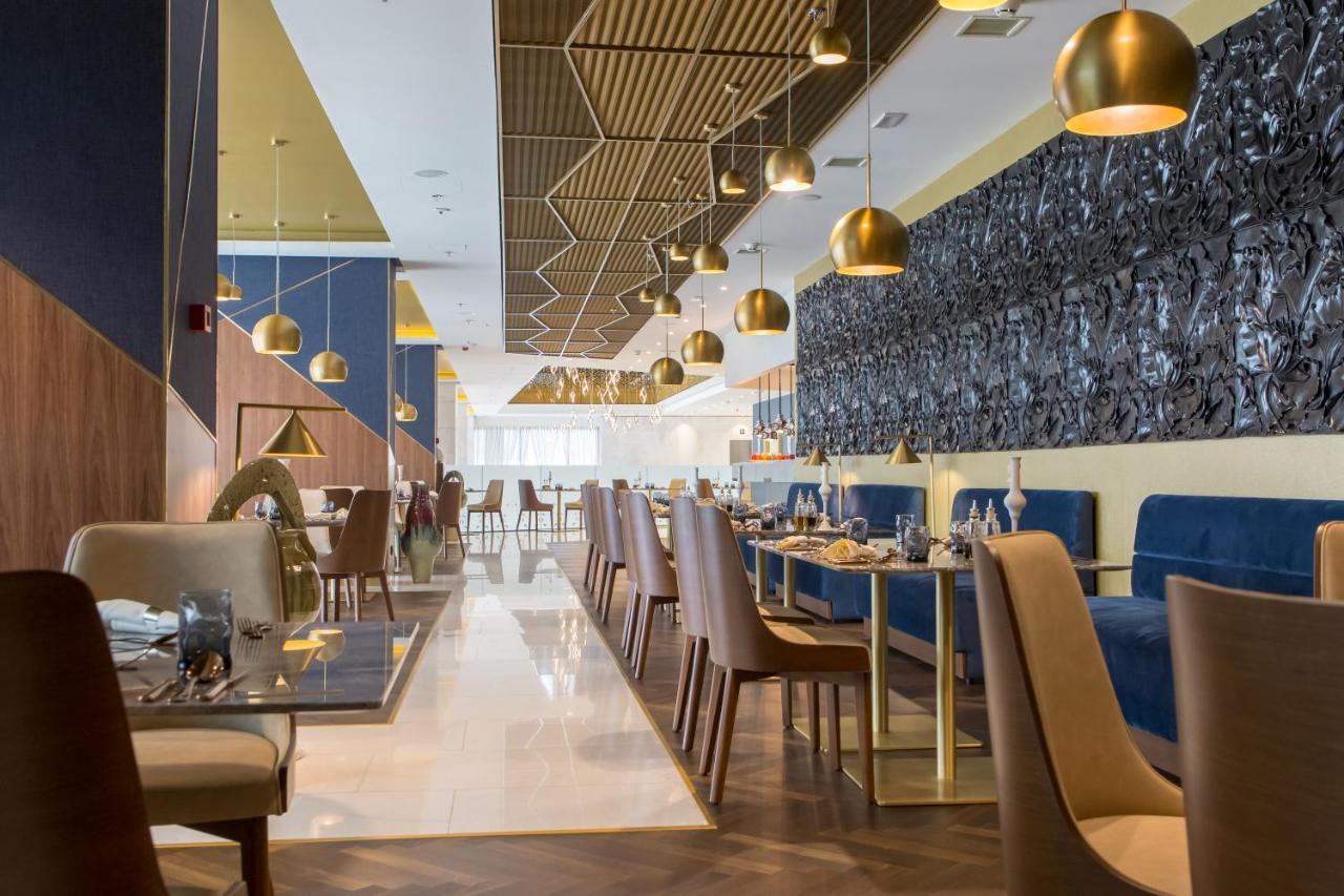스위소텔 사라예보 호텔 외부 사진 The interior of the restaurant